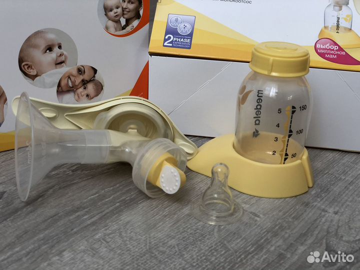 Молокоотсос medela ручной
