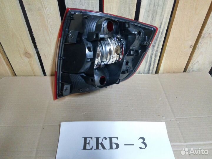 Фонарь левый Skoda Rapid 2012