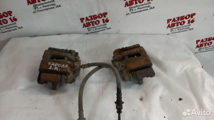 Суппорт задний левый Toyota Corolla E120