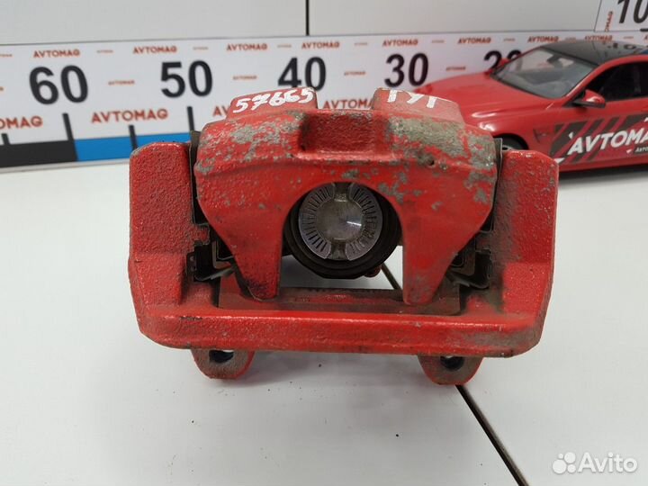 Суппорт задний левый (Geely Tugella)