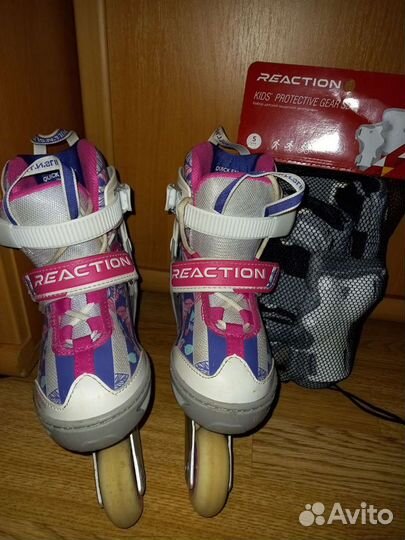 Роликовые коньки