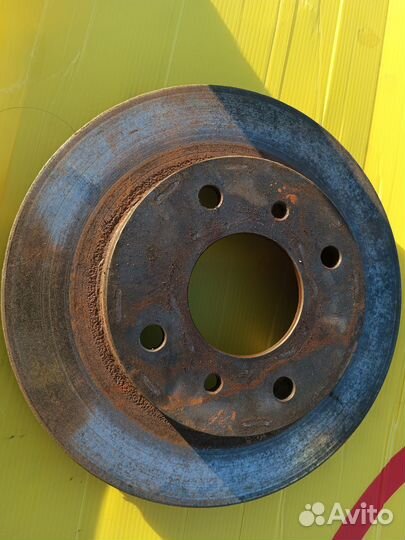 Тормозной диск на Ниссан примера 11
