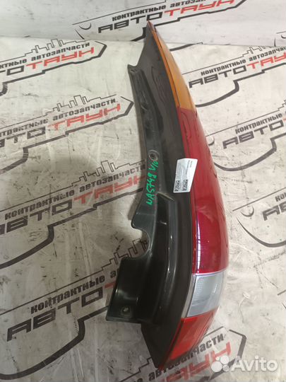 Фонарь nissan tino HV10 PV10 V10 22063522 правый 265504U025 NA5749