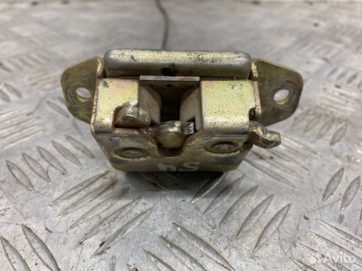 Б/У замок крышки багажника Toyota Duet M110A ejde