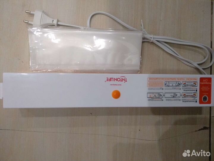 Вакуумная упаковочная машина