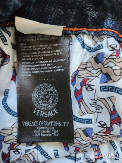 Джинсы versace