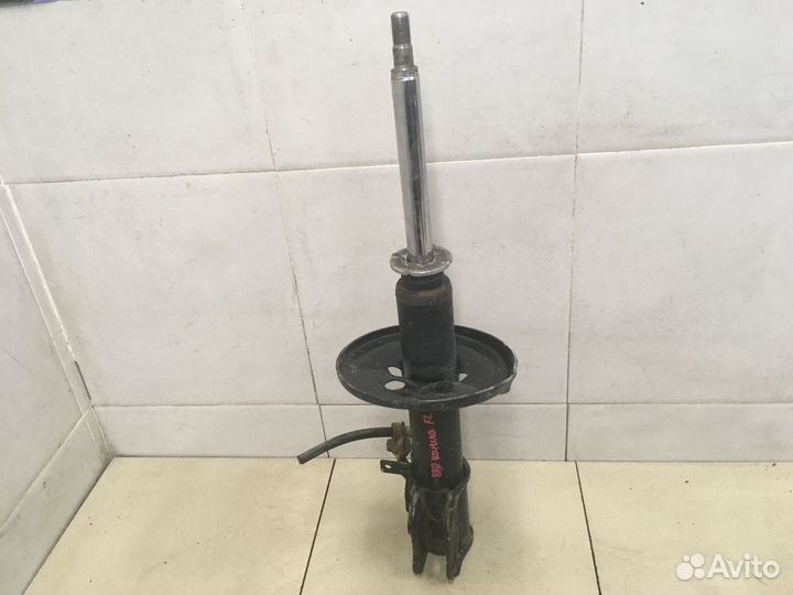 Амортизатор передний левый Carina E 1992-1997