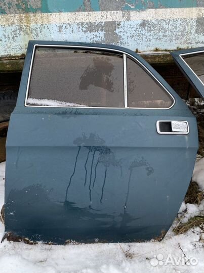 Двери от волги 3110