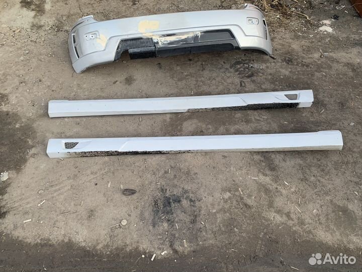 Бампер и накладки на пороги калина