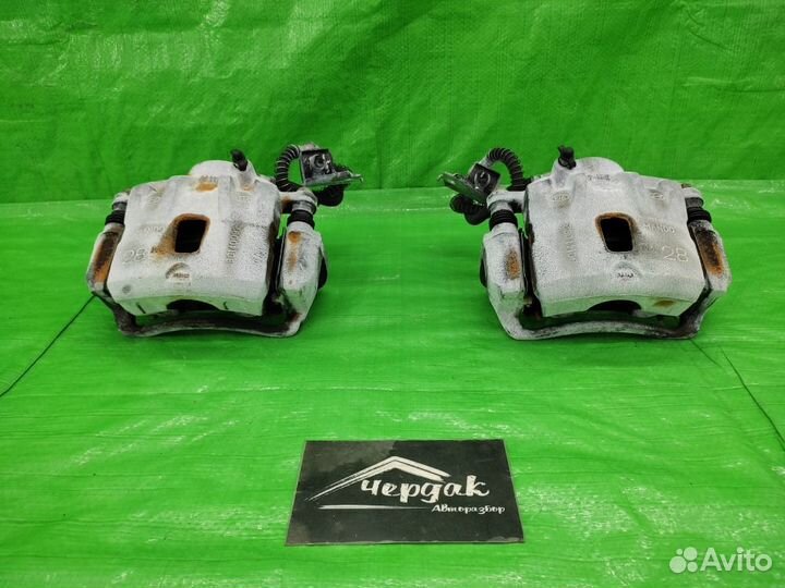 Суппорта передние Tucson / Sportage 2 2004-2010