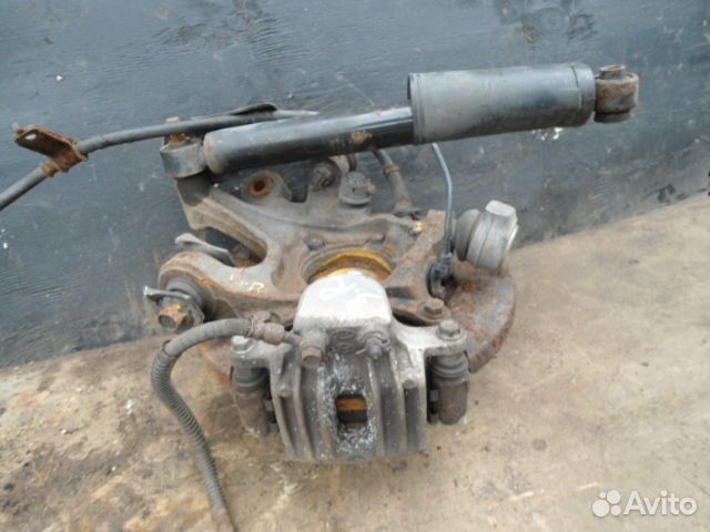 Суппорт задний правый Hyundai Santa Fe 2 CM