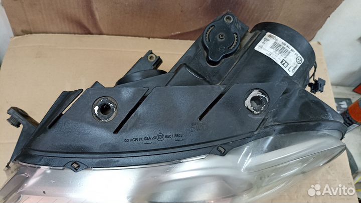 Фара левая WV Passat B6