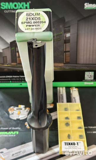 Сверло со сменными пластинами