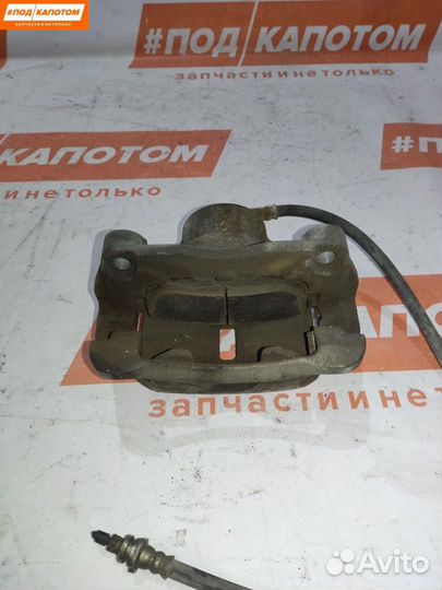 Суппорт тормозной передний правый Nissan X-Trail