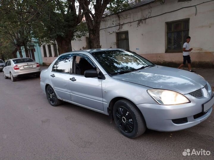 Mitsubishi Lancer 1.3 МТ, 2004, битый, 231 000 км