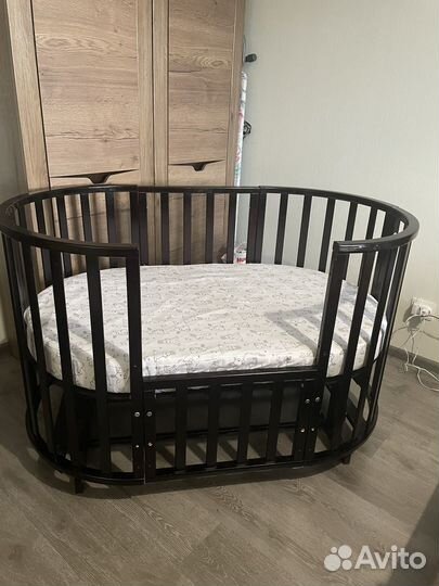 Детская кроватка трансформер с маятником