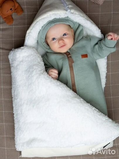 Меховой конверт в коляску