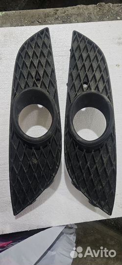 Накладки на противотуманные фары Опель Astra H