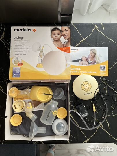Молокоотсос medela электрический