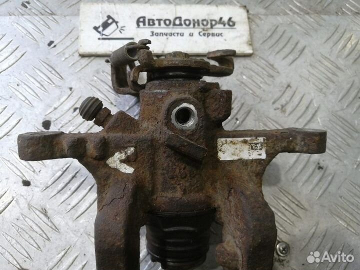 Суппорт задний левый Chevrolet Cruze