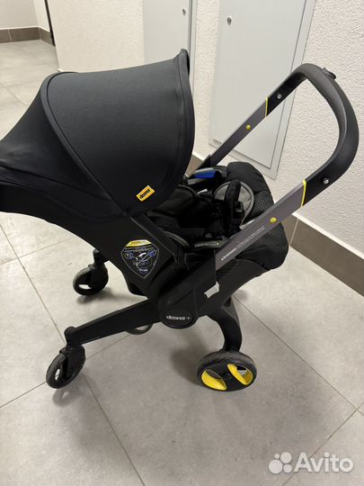 Коляска автолюлька doona