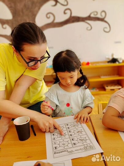 Преподаватель английского языка