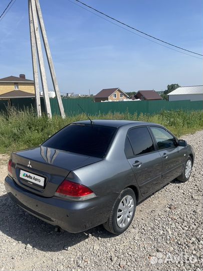 Mitsubishi Lancer 1.6 МТ, 2005, 231 000 км