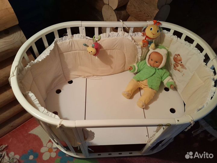 Детская кроватка трансформер овальная на колёсах