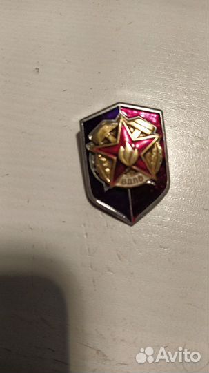 Значки, кокарды и пуговицы