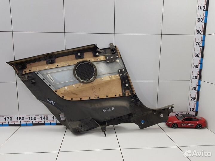 Обшивка салона задняя правая (Opel Astra)