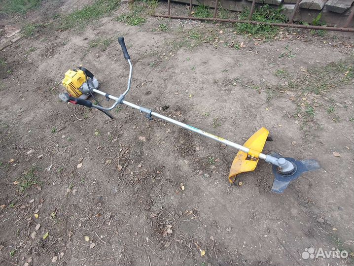 Триммер бензиновый champion t-523