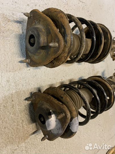 Стойка передняя правая Mitsubishi Lancer 7