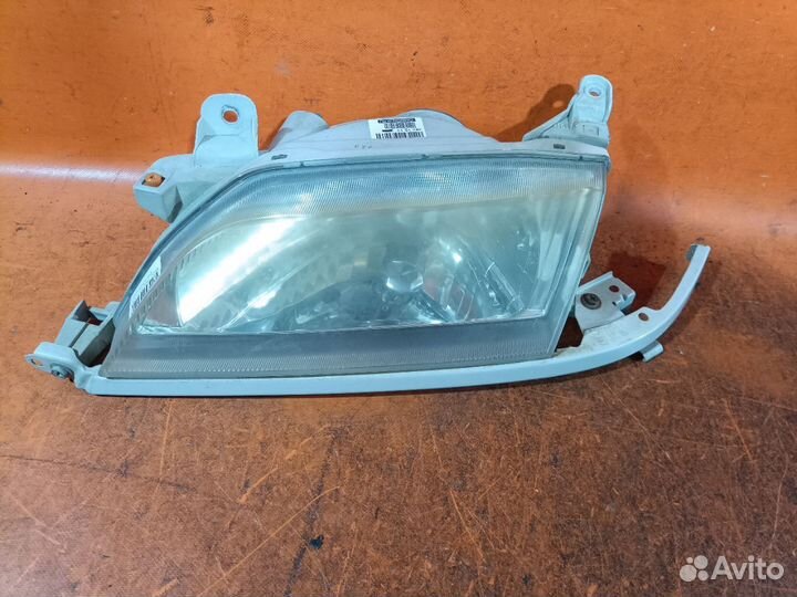 Фара Toyota Corona premio ST210 (Левое)