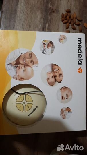 Молокоотсос medela электрический