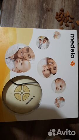 Молокоотсос medela электрический