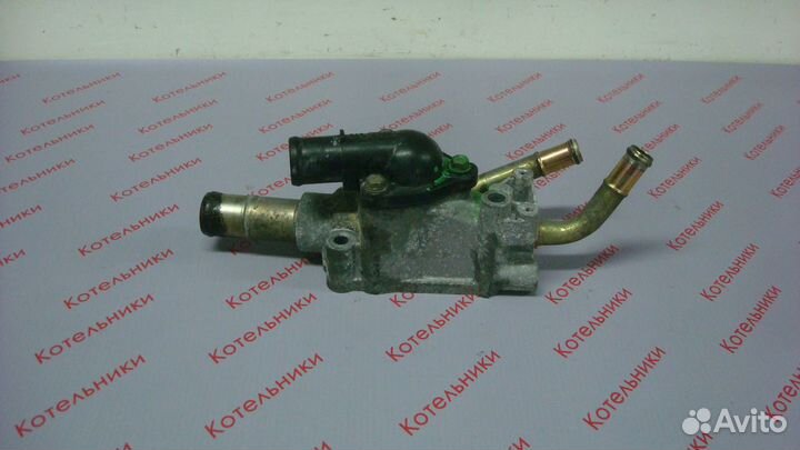 Nissan 11061-4M500 Корпус термостата