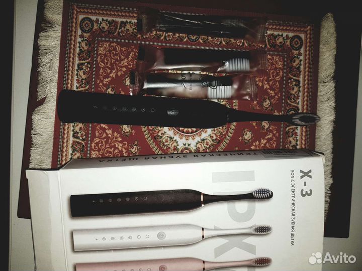 Электрическая зубная щетка новая