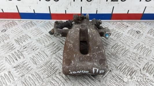 Суппорт тормозной задний правый opel zafira B (JDN