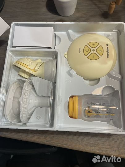 Молокоотсос medela swing flex электрический