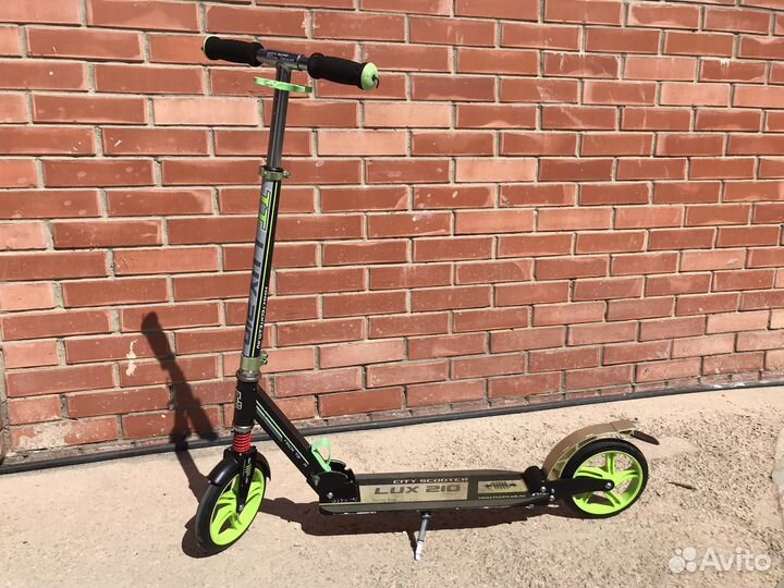 Самокат взрослый с двумя амортизаторами