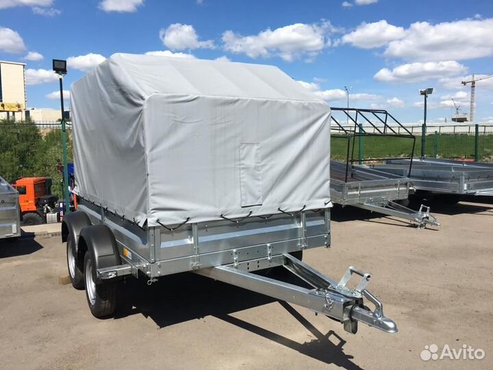 Легковой двухосный прицеп с высоким тентом