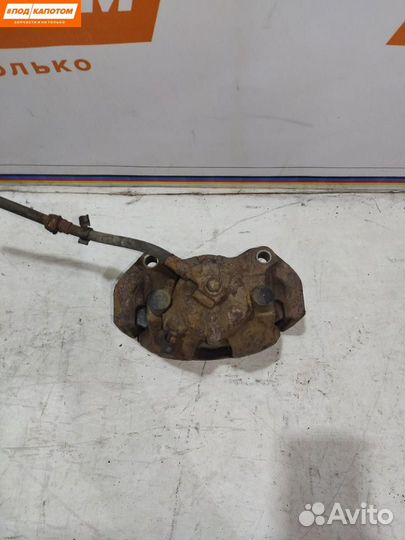 Суппорт тормозной передний правый Opel Astra H