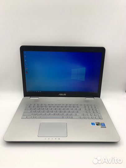 Большой, мощный, металлический ноутбук