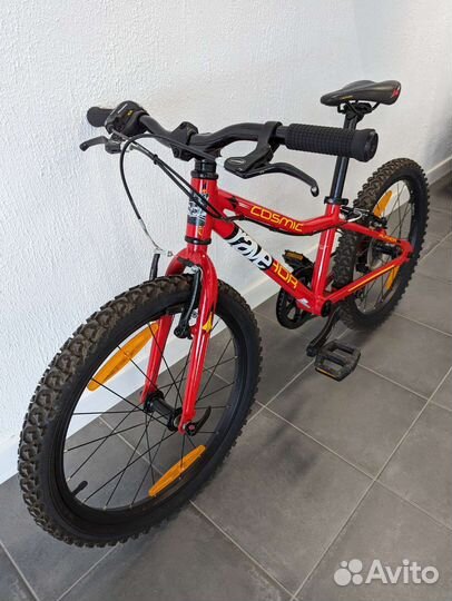 Красный детский велосипед на 5-8 лет