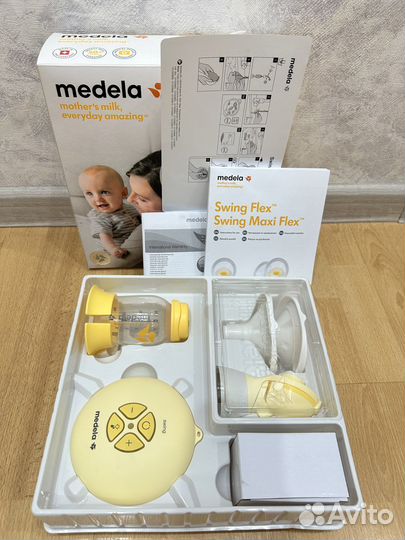 Молокоотсос medela swing flex электрический