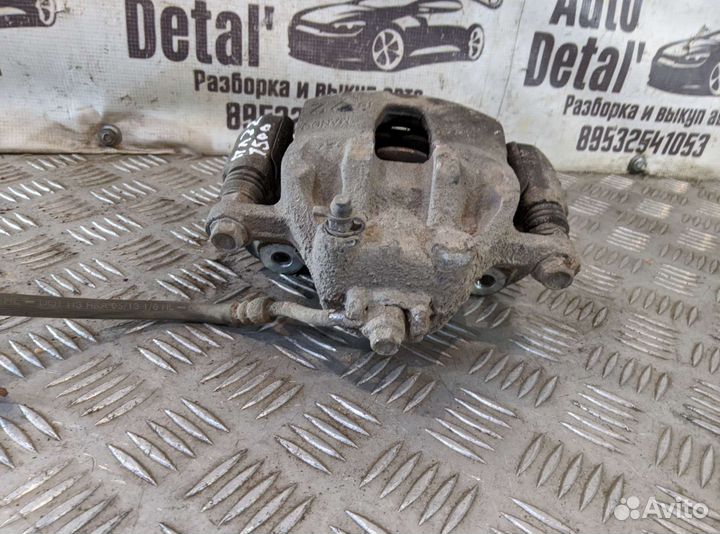 Суппорт передний левый kia rio 3