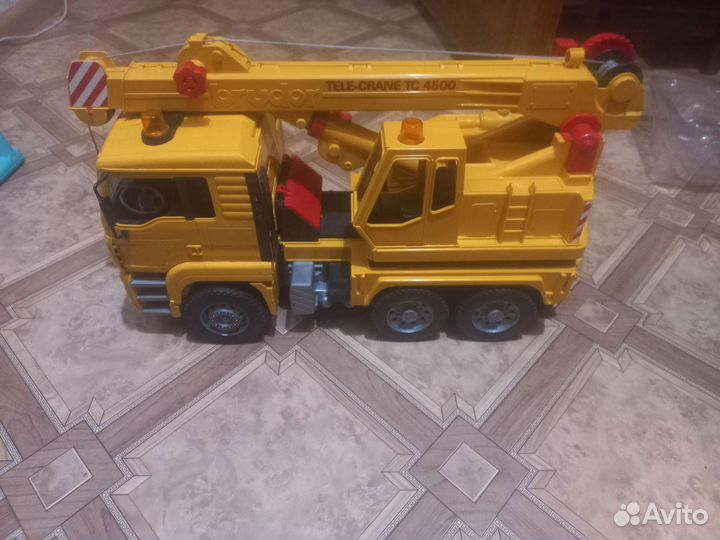 Игрушка MAN кран bruder