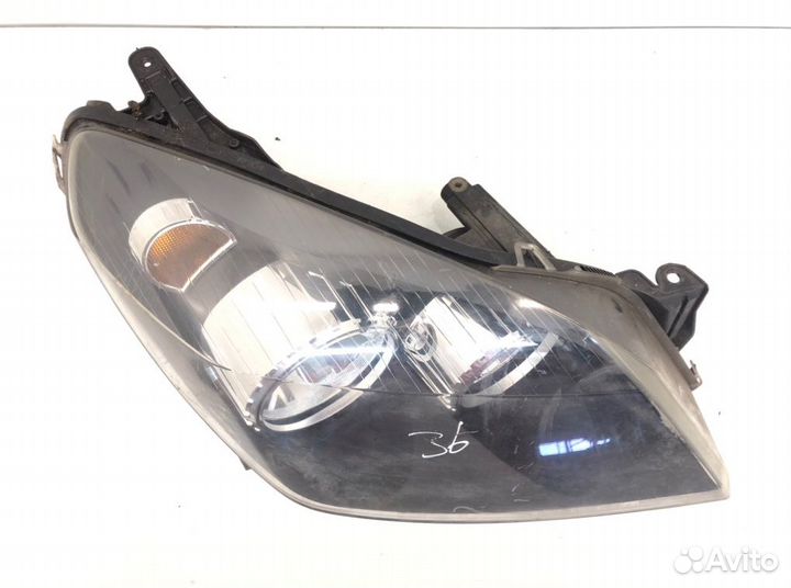 Фара 24451031 Opel Astra H (2004-2010)