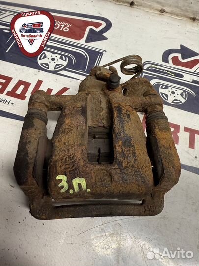 Суппорт задний левый Hyundai / Kia оригинал