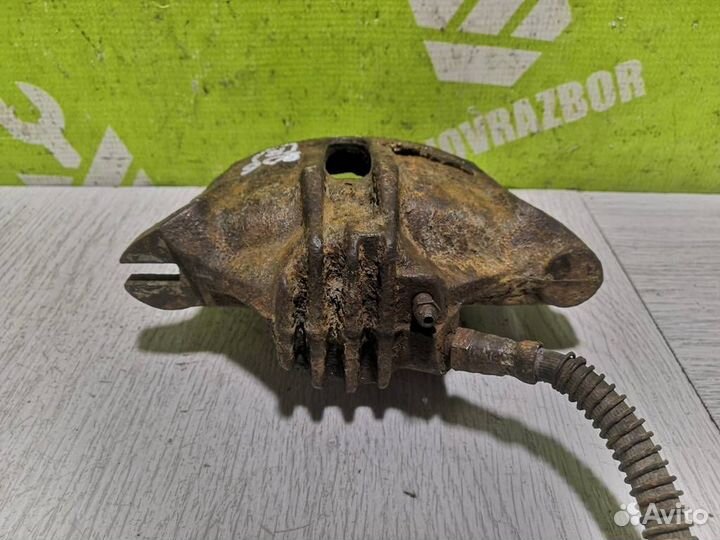 Суппорт передний правый Пежо 206